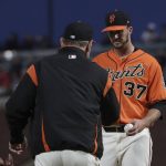 San Francisco Giants pitcher Drew Pomeranz (37) hands the ball to manager Bruce Bochy as he is taken out for a relief pitcher during the third inning of the team's baseball game against the Arizona Diamondbacks in San Francisco, Friday, May 24, 2019. (AP Photo/Jeff Chiu)