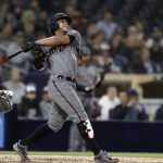 Arizona Diamondbacks' Ketel Marte hits a double during the sixth inning of a baseball game against the San Diego Padres, Monday, May 20, 2019, in San Diego. (AP Photo/Gregory Bull)