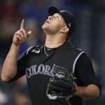 Colorado Rockies relief pitcher Carlos Estevez gestures after retiring Arizona Diamondbacks' Kevin Cron for the final out in the top of the seventh inning of a baseball game Wednesday, May 29, 2019, in Denver. (AP Photo/David Zalubowski)