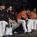 San Francisco Giants players sit in the dugout during the sixth inning of the team's baseball game against the Arizona Diamondbacks in San Francisco, Friday, May 24, 2019. (AP Photo/Jeff Chiu)