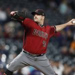 Arizona Diamondbacks relief pitcher Andrew Chafin works against the Colorado Rockies during the eighth inning of a baseball game Wednesday, May 29, 2019, in Denver. The Rockies won 5-4. (AP Photo/David Zalubowski)