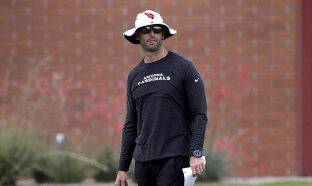 Arizona Cardinals head coach Kliff Kingsbury watch his team during an NFL Football organized team a...