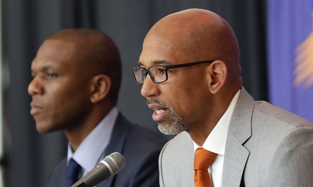 Phoenix Suns new NBA basketball head coach Monty Williams, right, speaks as general manger James Jo...