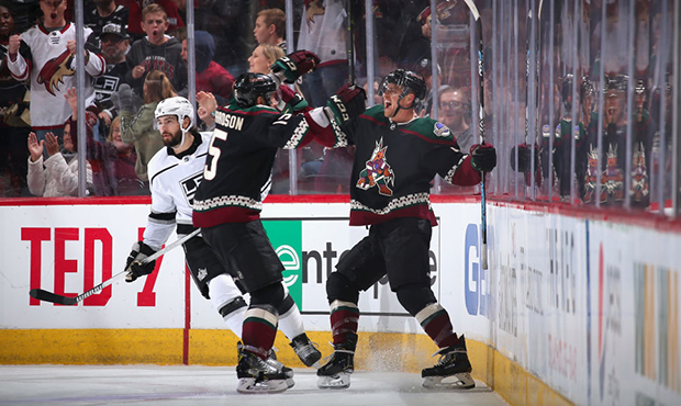 Michael Grabner #40 of the Arizona Coyotes celebrates with Brad Richardson #15 after scoring a goal...