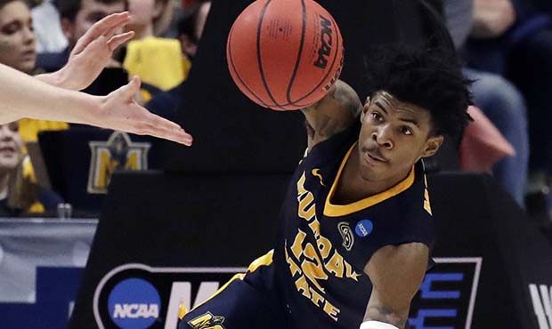 Murray State's Ja Morant (12) scrambles for the ball during the second half of a first round men's ...