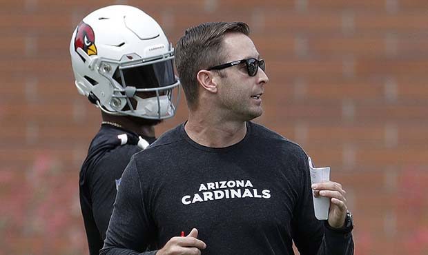 Arizona Cardinals' quarterback Kyler Murray watches has head coach Kliff Kingsbury instructs during...