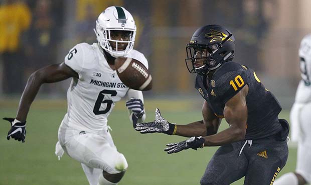Arizona State wide receiver Kyle Williams (10) makes a catch in front of Michigan State safety Davi...