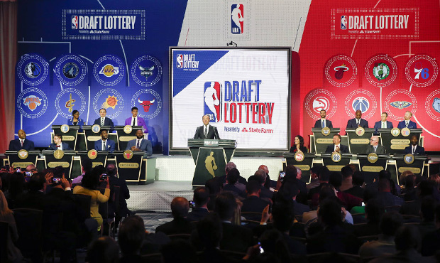 NBA Deputy Commissioner Mark Tatum gets ready to announce the order of the picks during the NBA bas...