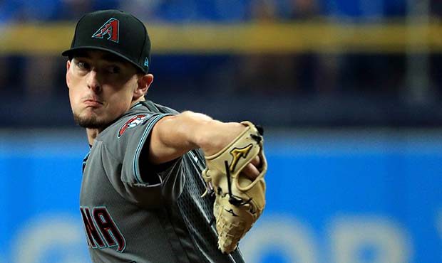 Taylor Clarke #45 of the Arizona Diamondbacks pitches during a game against the Tampa Bay Rays at T...