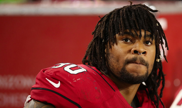 Defensive tackle Robert Nkemdiche #90 of the Arizona Cardinals on the bench during the preseason NF...