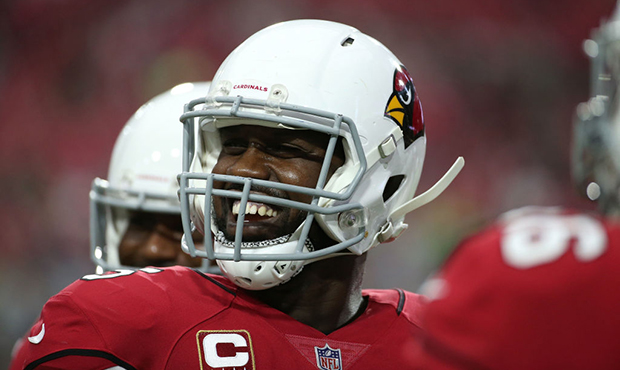 Defensive end Chandler Jones #55 of the Arizona Cardinals warms up before the game against the Seat...