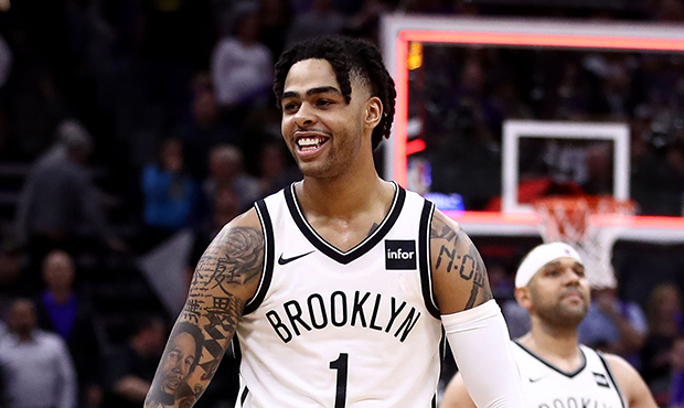 D'Angelo Russell #1 of the Brooklyn Nets reacts after the Nets came back to beat the Sacramento Kin...