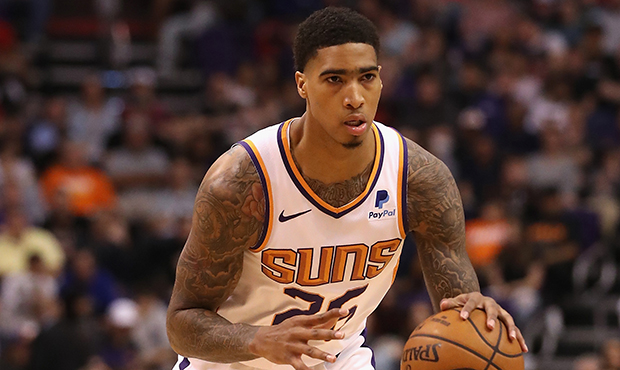 Ray Spalding #26 of the Phoenix Suns  handles the ball during the first half of the NBA game agains...