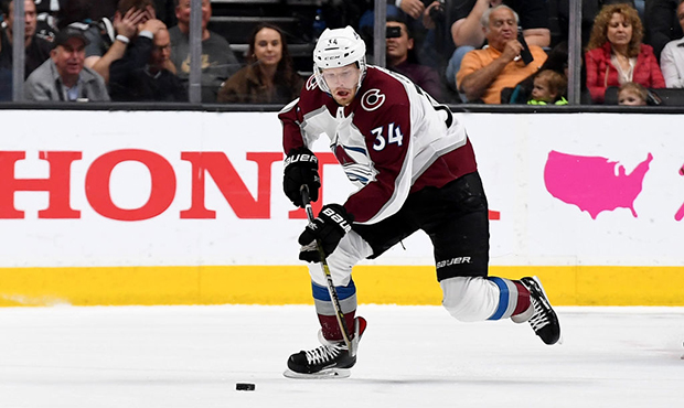 Carl Soderberg #34 of the Colorado Avalanche skates up ice with control of the puck against the San...