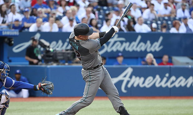 Kevin Cron #32 of the Arizona Diamondbacks hits a three-run home run for his first career MLB home ...