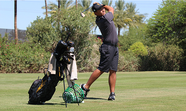 Chun An Yu practices his irons on ASU Karsten Golf Course. Yu is one of 20 amatuers that qualified ...