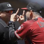 Arizona Diamondbacks manager Torey Lovullo, right, gestures to home plate umpire Mike Muchlinski after his ejection in the fifth inning of a baseball game against the San Francisco Giants, Sunday, June 30, 2019, in San Francisco. (AP Photo/Ben Margot)