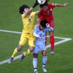 Thailand goalkeeper Waraporn Boonsing, left, reaches up to take the ball from teammate Kanjanaporn Saenkhun and United States' Carli Lloyd, right, during the Women's World Cup Group F soccer match between the United States and Thailand at the Stade Auguste-Delaune in Reims, France, Tuesday, June 11, 2019. (AP Photo/Francois Mori)