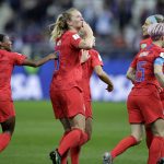 United States' scorer Samantha Mewis, center, and her teammates celebrate their side's 4rth goal during the Women's World Cup Group F soccer match between United States and Thailand at the Stade Auguste-Delaune in Reims, France, Tuesday, June 11, 2019. (AP Photo/Alessandra Tarantino)