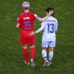 Thailand's Orathai Srimanee congratulates United States' Megan Rapinoe, left, after their Women's World Cup Group F soccer match between the United States and Thailand at the Stade Auguste-Delaune in Reims, France, Tuesday, June 11, 2019. The US defeated Thailand 13-0.(AP Photo/Francois Mori)