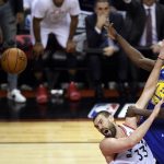 Toronto Raptors centre Marc Gasol (33) fouls Golden State Warriors forward Draymond Green (23) during second-half basketball action in Game 5 of the NBA Finals in Toronto, Monday, June 10, 2019. (Nathan Denette/The Canadian Press via AP)