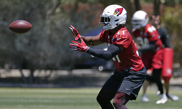 Arizona Cardinals' David Johnson catches the ball during an NFL football practice, Wednesday, May 2...