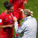 United States' coach Jill Ellis gestures as she talks to her player Carli Lloyd during the Women's World Cup Group F soccer match between the United States and Thailand at the Stade Auguste-Delaune in Reims, France, Tuesday, June 11, 2019. (AP Photo/Francois Mori)