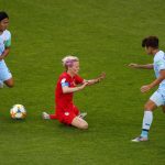 United States' Megan Rapinoe, centre, falls as Thailand's Kanjana Sung-Ngoen, left, and Ainon Phancha chase the gal during the Women's World Cup Group F soccer match between the United States and Thailand at the Stade Auguste-Delaune in Reims, France, Tuesday, June 11, 2019. (AP Photo/Francois Mori)