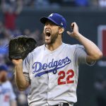 Los Angeles Dodgers starting pitcher Clayton Kershaw shouts after giving up a three-run home run to Arizona Diamondbacks' Christian Walker during the first inning of a baseball game Monday, June 24, 2019, in Phoenix. (AP Photo/Ross D. Franklin)