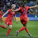 United States' Megan Rapinoe, left, and United States' scorer Mallory Pugh, right, celebrate their side's 11th goal during the Women's World Cup Group F soccer match between United States and Thailand at the Stade Auguste-Delaune in Reims, France, Tuesday, June 11, 2019. (AP Photo/Alessandra Tarantino)