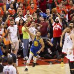 Golden State Warriors' Stephen Curry (30) celebrates at the final buzzer as his team defeated the Toronto Raptors 106-105 in Game 5 of the NBA Finals in Toronto on Monday June 10, 2019. (Chris Young/The Canadian Press via AP)