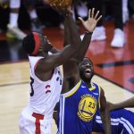Golden State Warriors forward Draymond Green (23) battles for the ball against Toronto Raptors forward Pascal Siakam (43) during second-half basketball action in Game 5 of the NBA Finals in Toronto, Monday, June 10, 2019. (Nathan Denette/The Canadian Press via AP)