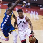 Toronto Raptors guard Kyle Lowry (7) drives to the net against Golden State Warriors forward Draymond Green (23) during second-half basketball action in Game 5 of the NBA Finals in Toronto, Monday, June 10, 2019. (Chris Young/The Canadian Press via AP)