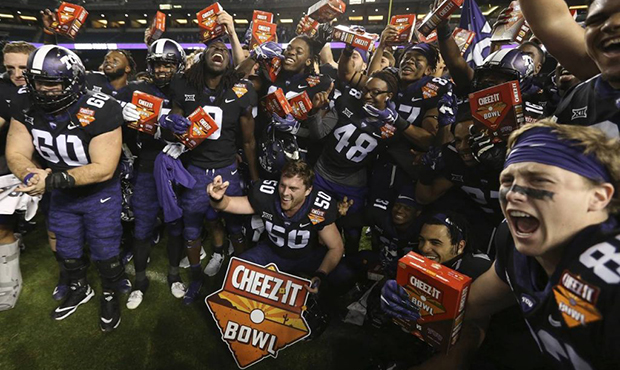 TCU players celebrate a 10-7 overtime win against California in the Cheez-It Bowl NCAA college foot...