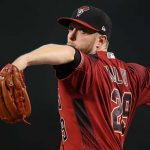 PHOENIX, ARIZONA - JUNE 23:  Starting pitcher Merrill Kelly #29 of the Arizona Diamondbacks throws a warm-up pitch during the first inning of the MLB game against the San Francisco Giants at Chase Field on June 23, 2019 in Phoenix, Arizona. (Photo by Christian Petersen/Getty Images)