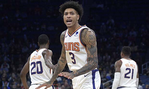 Phoenix Suns forward Kelly Oubre Jr. (3) reacts after making a 3-pointer during the first half of t...