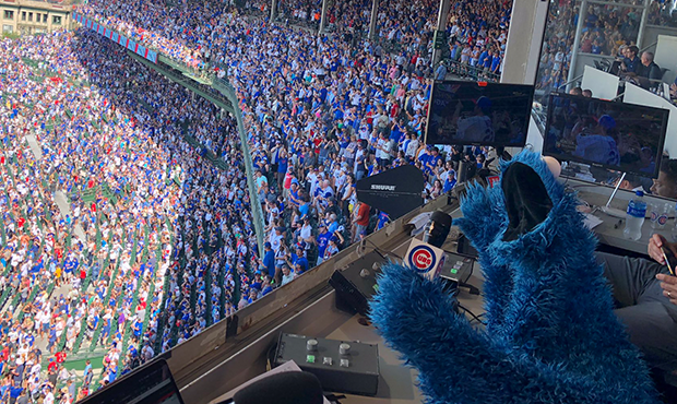 Cookie Monster sings the seventh inning stretch at Wrigley Field Thursday. (@ChicagoCubs/ Twitter)...