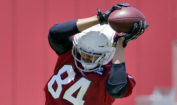 Arizona Cardinals' Caleb Wilson (84) works out during an NFL football organized team activity, Wedn...