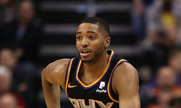 Mikal Bridges #25 of the Phoenix Suns handles the ball during the second half of the NBA game again...