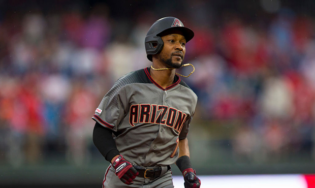 Jarrod Dyson #1 of the Arizona Diamondbacks rounds the bases after hitting a solo home run in the t...