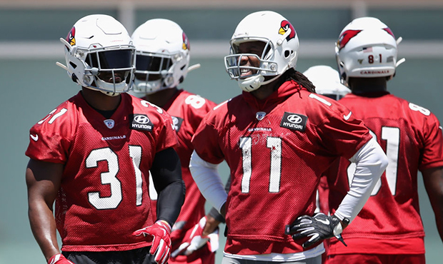 Running back David Johnson #31 and wide receiver Larry Fitzgerald #11 of the Arizona Cardinals prac...