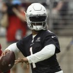 Arizona Cardinals quarterback Kyler Murray gets set to throw the ball during NFL football practice at State Farm Stadium Friday, July 26, 2019, in Glendale, Ariz. (AP Photo/Ross D. Franklin)
