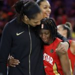 Las Vegas Aces' A'ja Wilson, of Team Wilson, left, embraces Indiana Fever's Erica Wheeler, of Team Wilson, after the WNBA All-Star game Saturday, July 27, 2019, in Las Vegas. (AP Photo/John Locher)