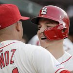 St. Louis Cardinals' Tyler O'Neill, right, is congratulated by Yairo Munoz after hitting a two-run home run during the third inning of a baseball game against the Arizona Diamondbacks on Saturday, July 13, 2019, in St. Louis. (AP Photo/Jeff Roberson)