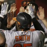 Baltimore Orioles' Dwight Smith Jr. celebrates his three-run home run against the Arizona Diamondbacks during the third inning of a baseball game Tuesday, July 23, 2019, in Phoenix. (AP Photo/Ross D. Franklin)