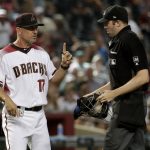 Arizona Diamondbacks manager Torey Lovullo (17) argues a call with home plate umpire Nic Lentz during the seventh inning of a baseball game against the Baltimore Orioles, Wednesday, July 24, 2019, in Phoenix. (AP Photo/Matt York)