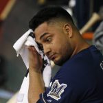 Milwaukee Brewers starting pitcher Jhoulys Chacin sits in the dugout after being pulled from the baseball game against the Arizona Diamondbacks during the third inning Friday, July 19, 2019, in Phoenix. (AP Photo/Ross D. Franklin)