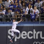 Los Angeles Dodgers center fielder Alex Verdugo watches a two-run home run Arizona Diamondbacks' Christian Walker during the fourth inning of a baseball game Wednesday, July 3, 2019, in Los Angeles. (AP Photo/Mark J. Terrill)