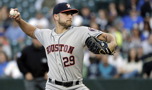 Houston Astros starting pitcher Corbin Martin throws against the Seattle Mariners during the first ...