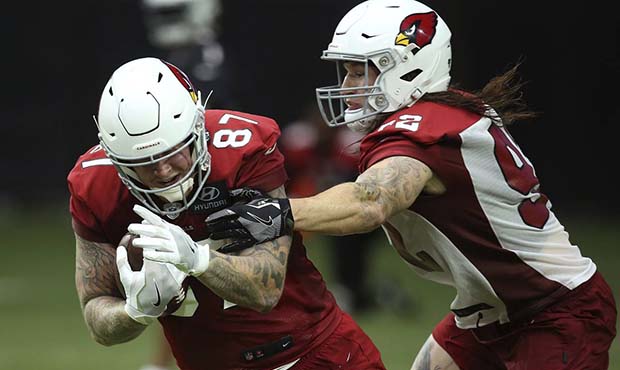 Arizona Cardinals tight end Maxx Williams (87) makes a catch in front of Cardinals linebacker Denni...